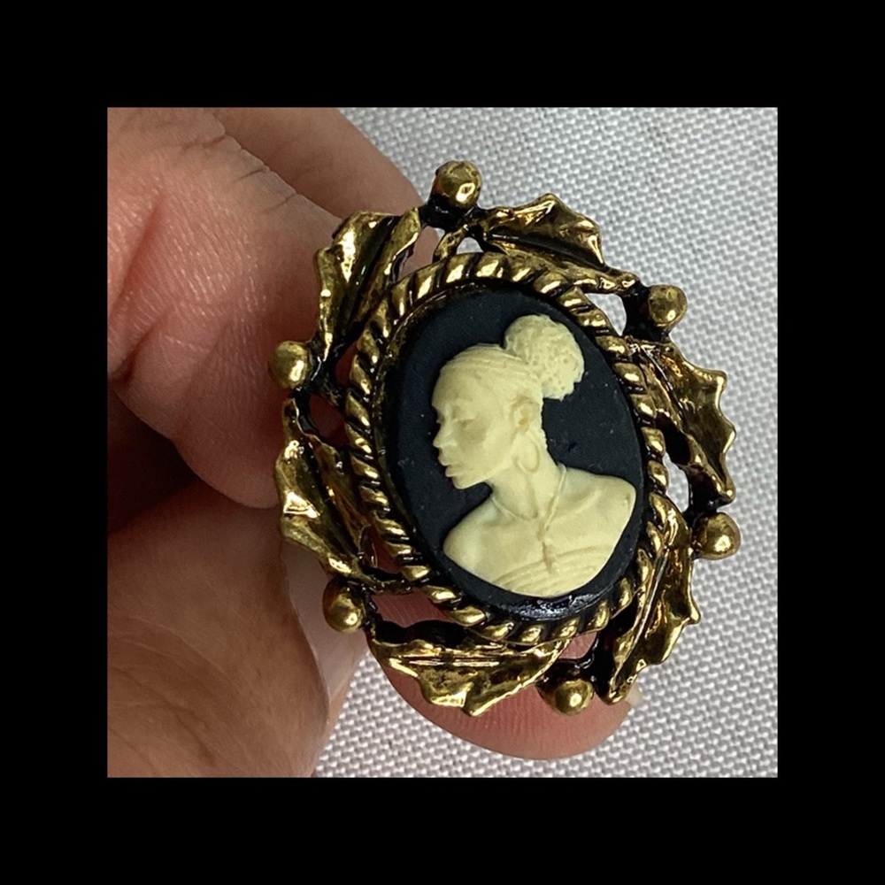 Elegant Gold and Black Cameo Brooch